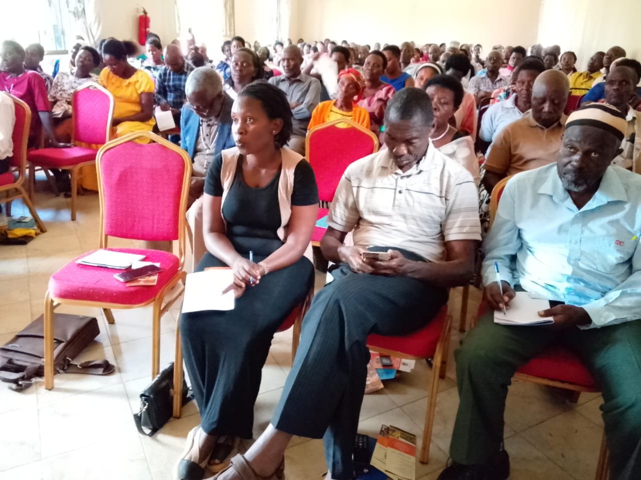 Community members participating in a health and livelihoods engagement